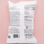 Back of Torres chips bag with a blush-pink background