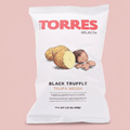 Torres Black Truffle chips with a blush-pink background